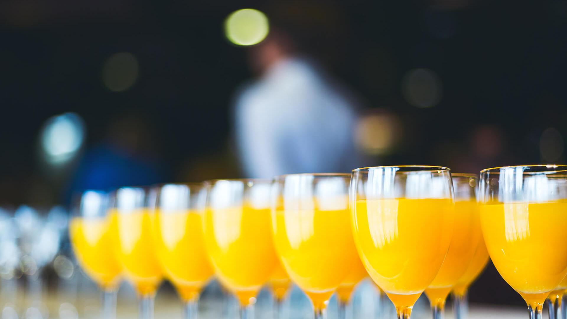 Glasses filled with orange juice