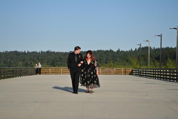 Burnaby Lake Pavilion wedding couple walking pier